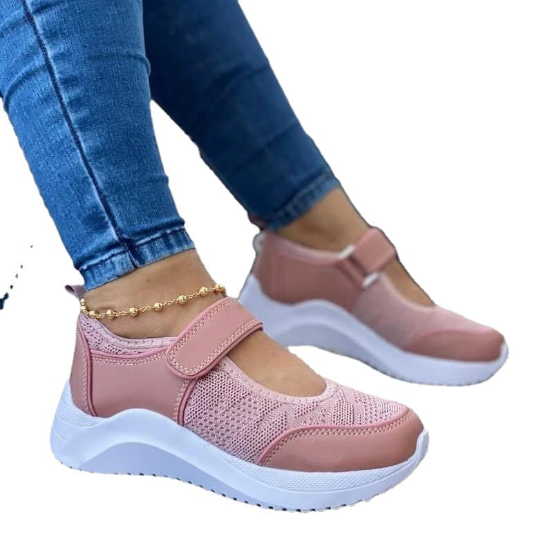Baskets plateforme en mesh pour femmes roses, présentant des matières en mesh et en suédine, avec une semelle blanche épaisse, conçues pour un usage décontracté.