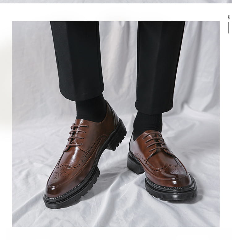 Men’s british style brown leather brogue oxford shoes with glossy finish and chunky black rubber soles.