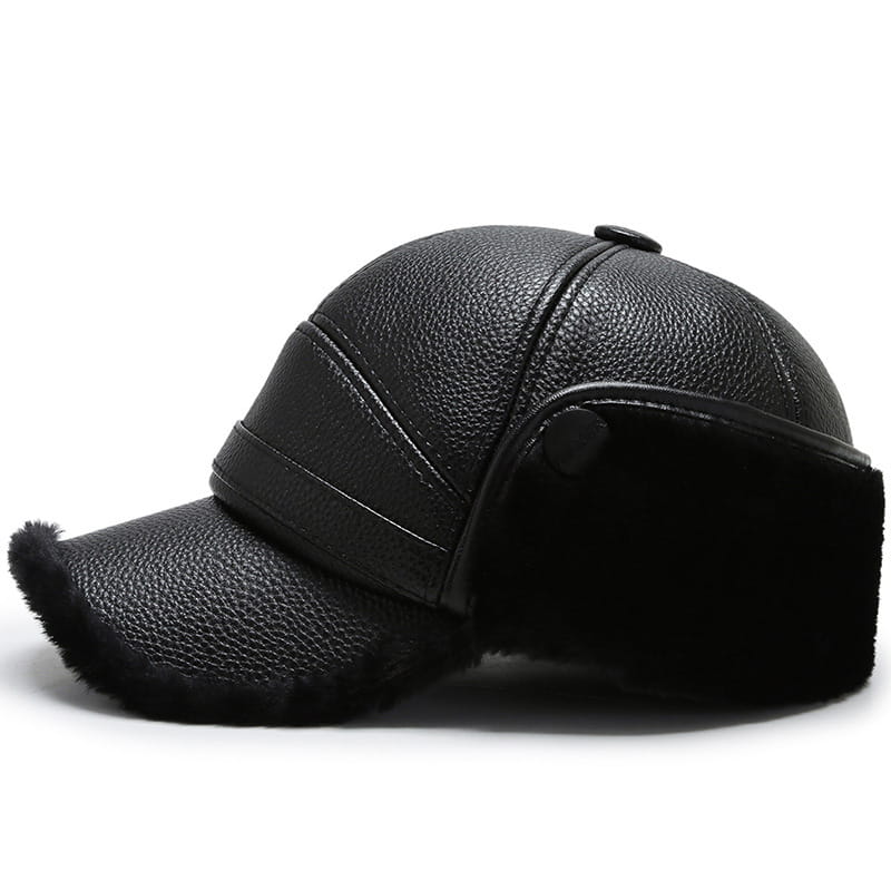 Men leather winter baseball cap in black with plush fur trim on the brim and ear flaps for warmth.