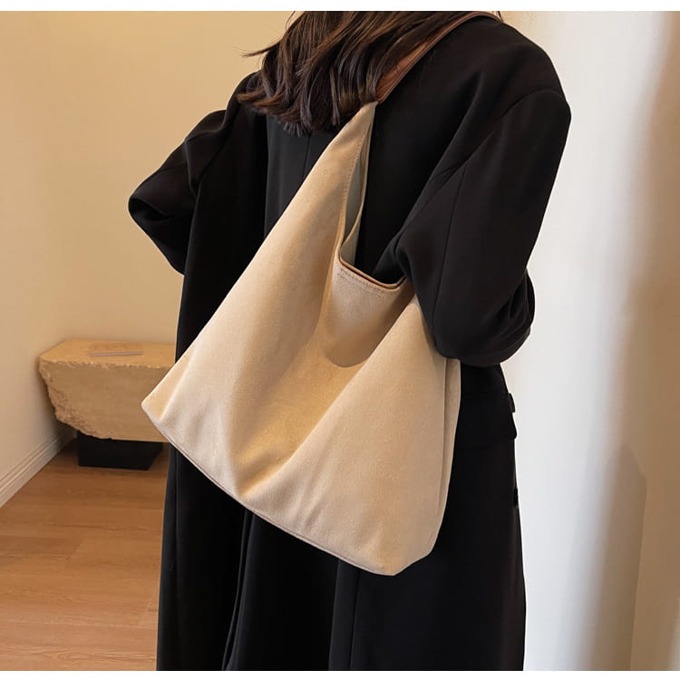 Beige canvas suede shoulder bag with a single shoulder strap large capacity slouchy tote bag.