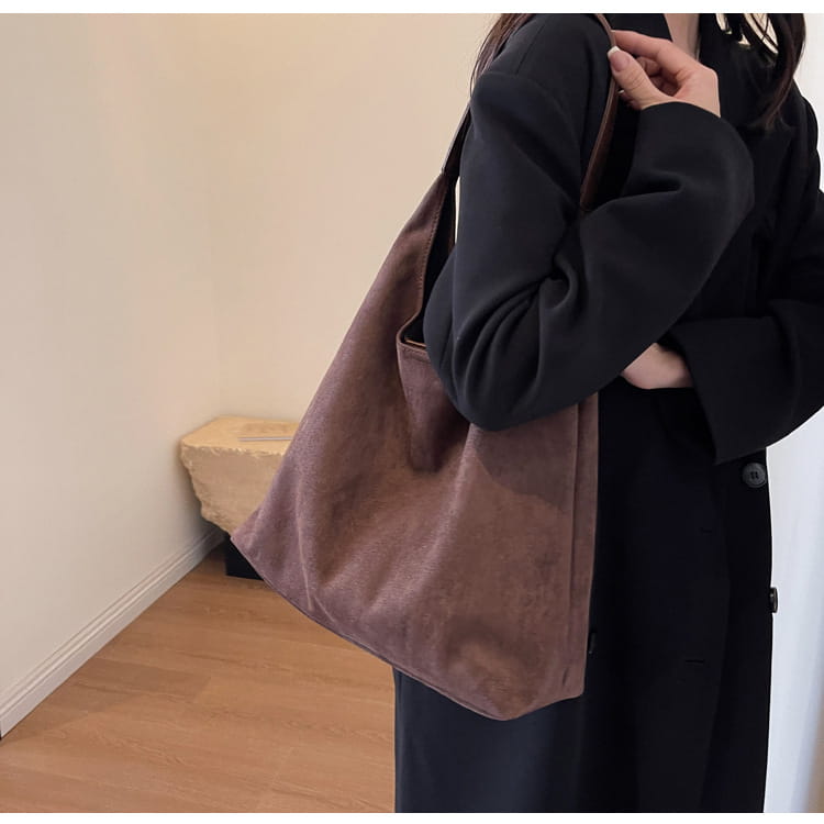 Brown suede shoulder bag large capacity slouchy tote bag with a soft slouchy design and matching strap.