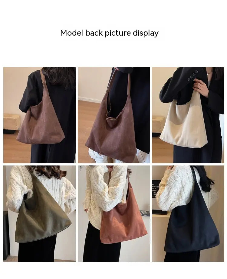 A soft slouchy canvas tote bag in earthy tones of brown beige olive green and navy blue designed as a large capacity suede shoulder bag.