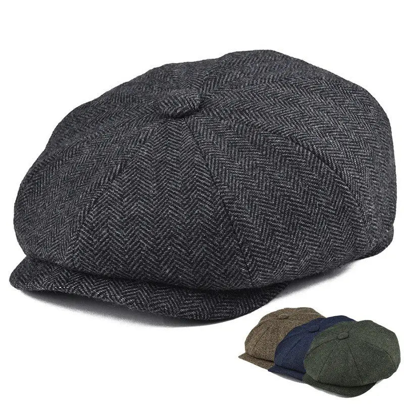 Dark gray herringbone-patterned wool newsboy hat for men made of textured woolen fabric.
