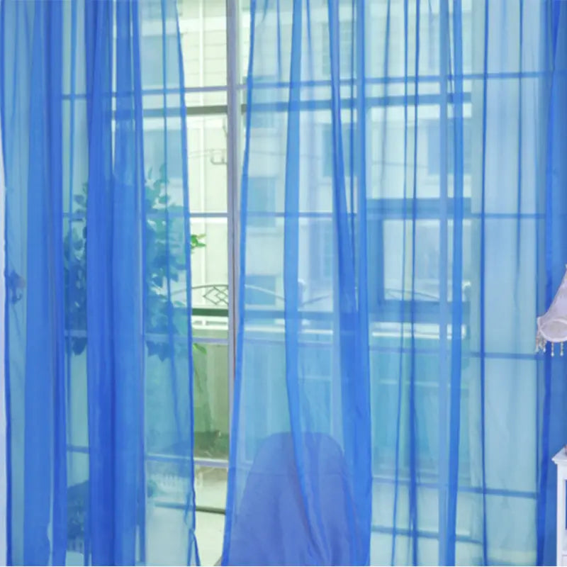 blue sheer tulle window curtain with vertical pleats suitable for living room and bedroom use