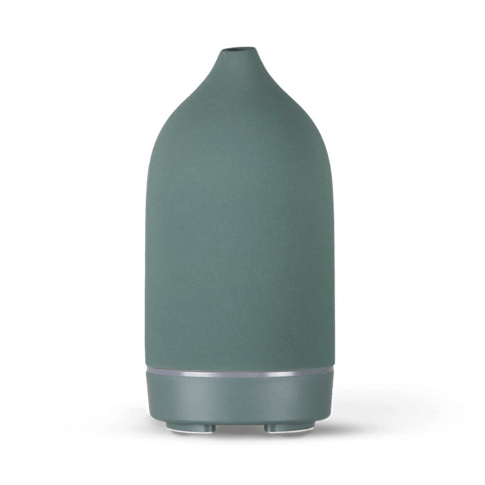 A sleek matte sage green ceramic ultrasonic aroma diffuser and humidifier with a minimalist design and a subtle metallic accent band at its base.