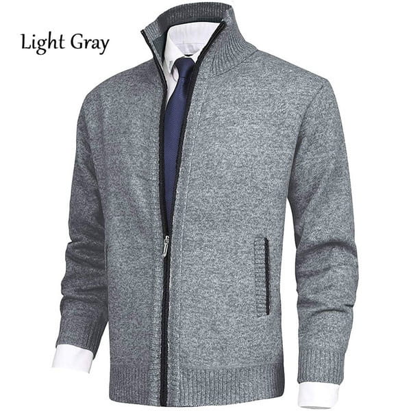 Herren-Cardigan mit Strukturstrick und Reißverschluss in Hellgrau, mit gerippten Bündchen und Saum, aus einem weichen Strukturstrickstoff gefertigt.