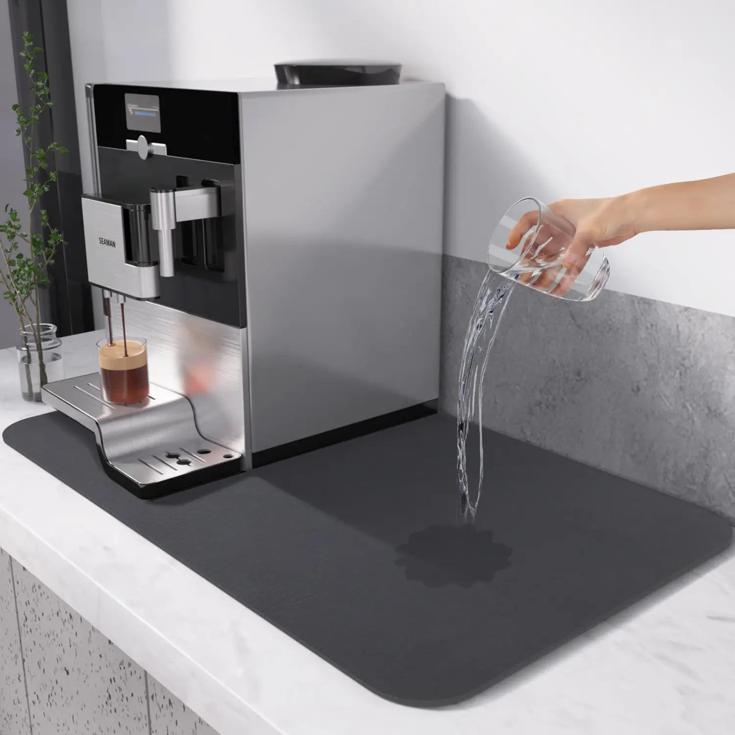 Modern silver and black Siemens coffee machine with sleek metallic finish on a coffee bar mat super absorbent rubber dish drying pad.