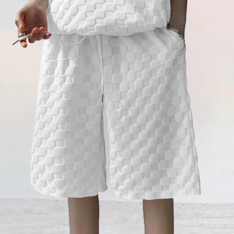 white shorts with a distinctive woven quilted texture from the textured geometric cotton blend t-shirt and shorts set