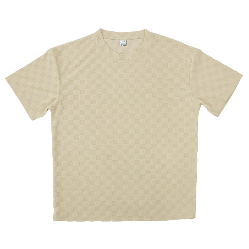 Beige short-sleeved textured geometric cotton blend t-shirt with a subtle checkered pattern from a t-shirt and shorts set.