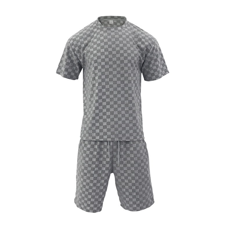 gray and white checkered short-sleeved pajama set with a relaxed fit made from textured geometric cotton blend fabric for comfortable loungewear.