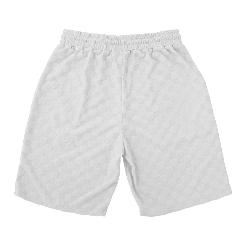 white shorts with a subtle textured geometric pattern and elastic waistband from a cotton blend t-shirt and shorts set