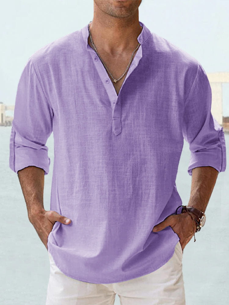 A light purple loose linen blend breathable long sleeve sports shirt with a buttoned placket and rolled cuffs.