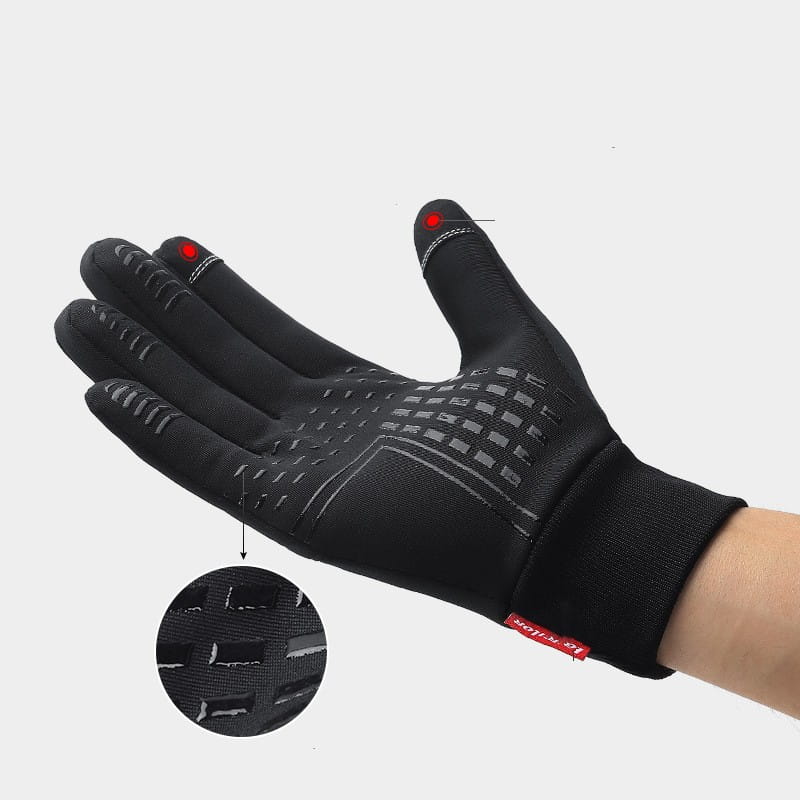 Gant de cyclisme pour écran tactile coupe-vent noir avec motifs de prise texturés gris et points d’accent rouges sur les extrémités des doigts, montrant le côté dos dans un design d’usage sportif.