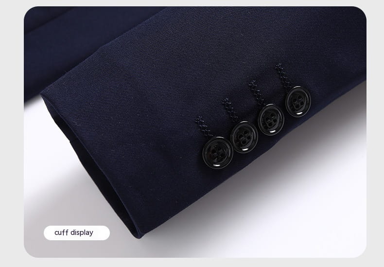 Men’s slim fit casual blazer suit jacket cuff in dark navy with four black buttons and subtle textured fabric.