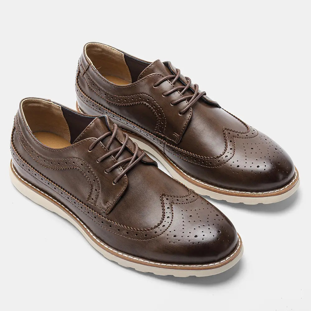 Men’s brogue casual leather sneakers in brown featuring perforated detailing and a white rubber sole.