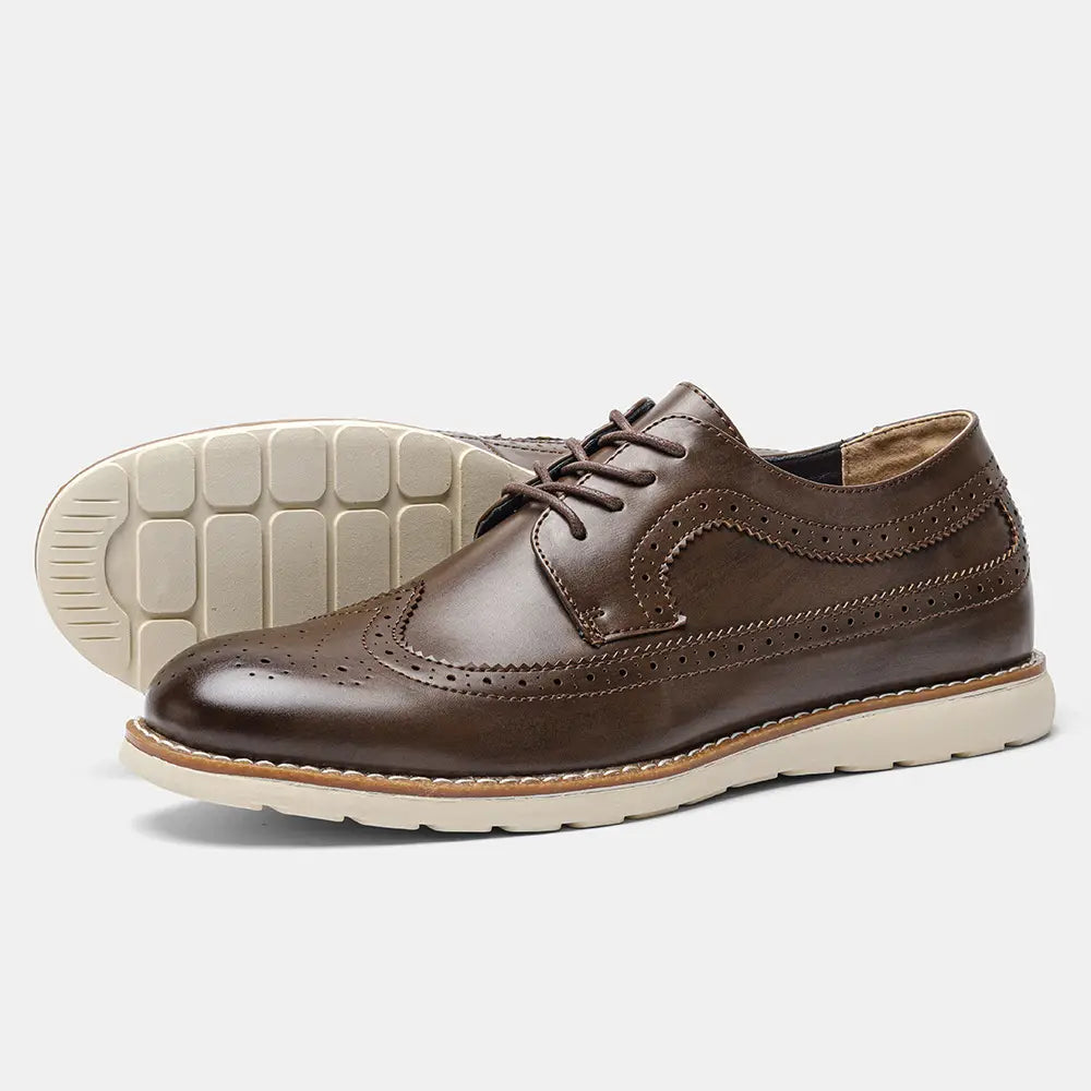 Men’s brogue casual leather sneakers in brown with perforated detailing and a cream-colored rubber sole designed for lightweight comfort.
