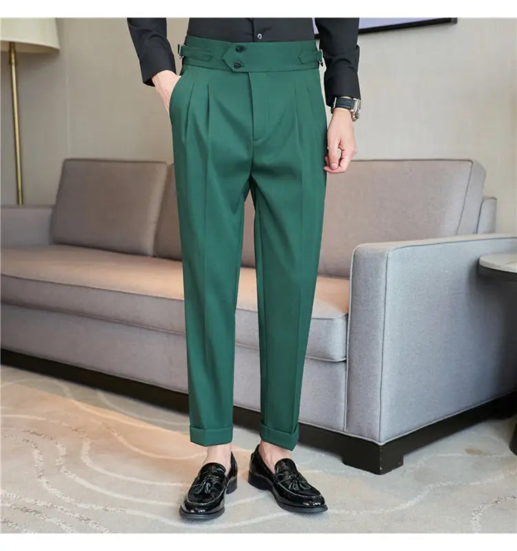 Dark green mens pleated drape casual trousers with a tailored fit, pleated front, and buttoned waistband.