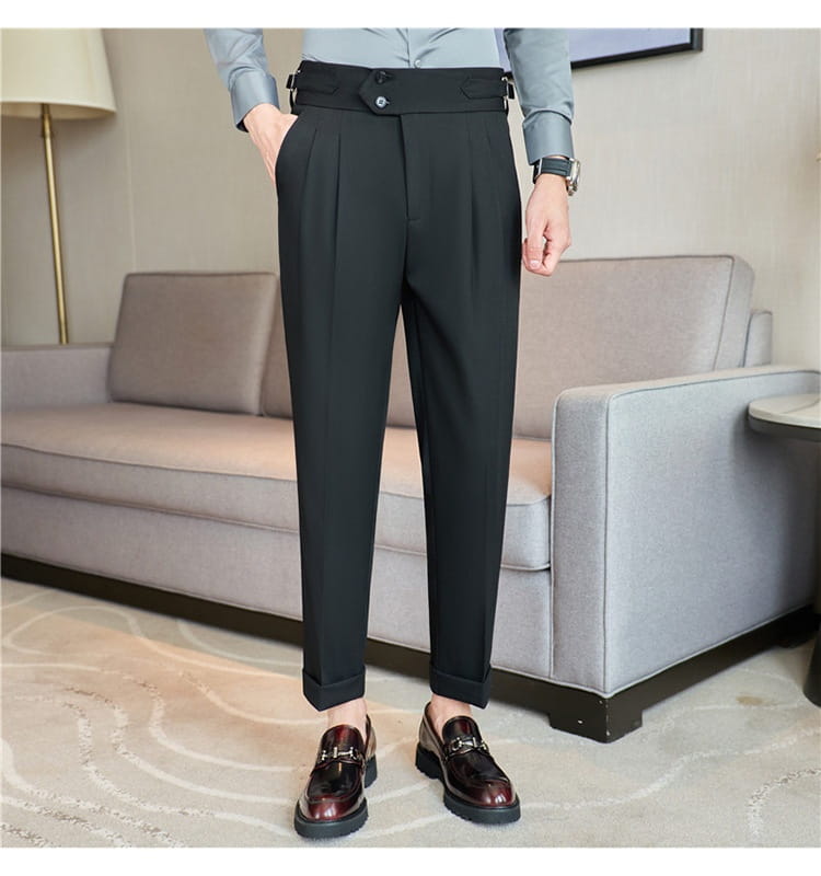 Black mens pleated drape casual trousers featuring a high waist, pleated front, and rolled cuffs in a tailored design.