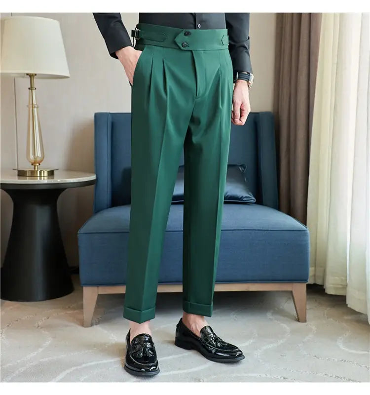 Emerald green mens pleated drape casual trousers with tailored fit and buttoned waistband.