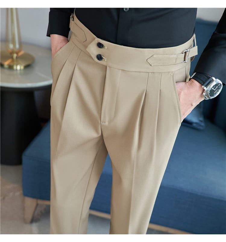 Beige pleated drape casual trousers for men featuring a wide waistband with two black buttons and a silver buckle.