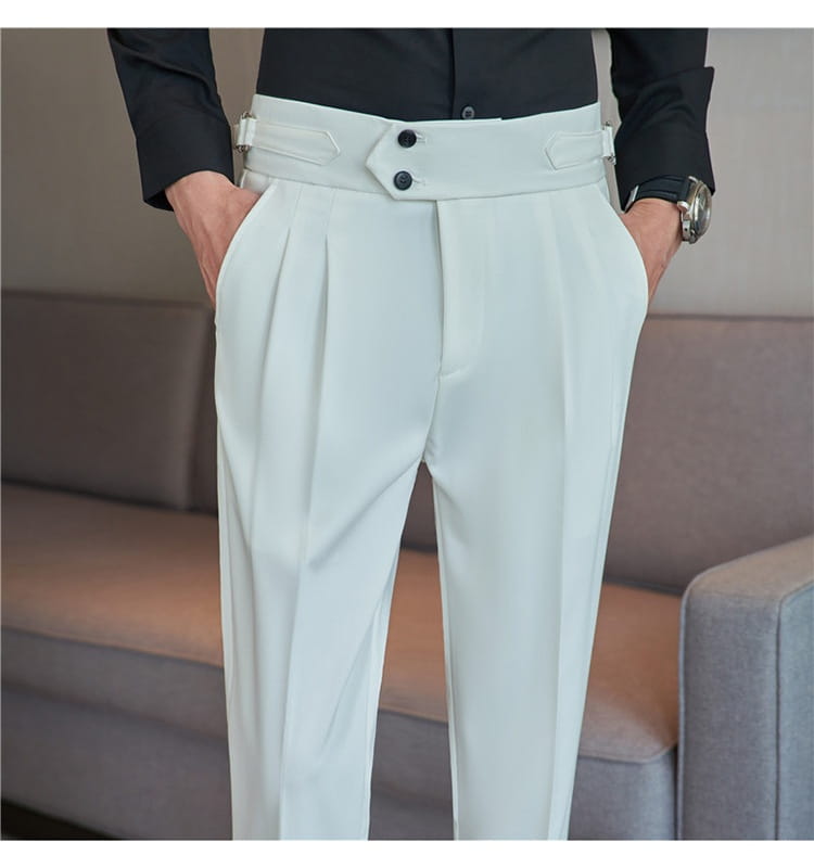 White high-waisted mens pleated drape casual trousers with black button accents and a tailored fit.