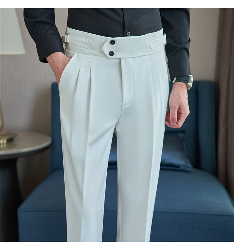 Mens pleated drape casual trousers in white featuring a wide structured belt with black buttons.