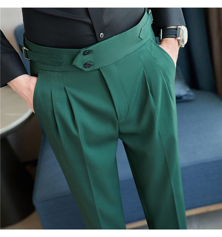 Dark green pleated drape casual men’s trousers with a wide waistband featuring two black buttons and belt loops.