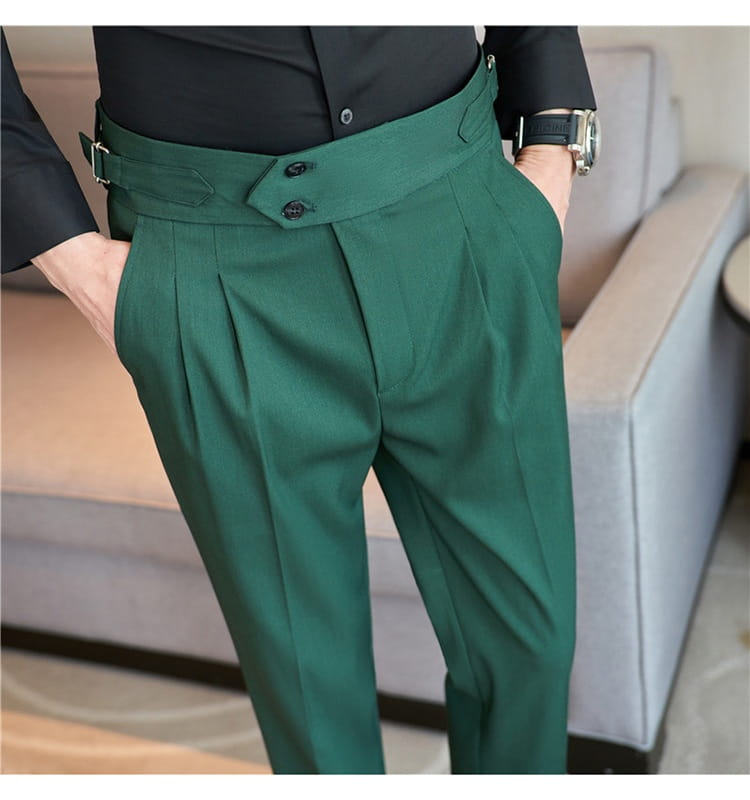Mens pleated drape casual trousers in dark green with a wide waistband featuring two black buttons and a silver buckle.