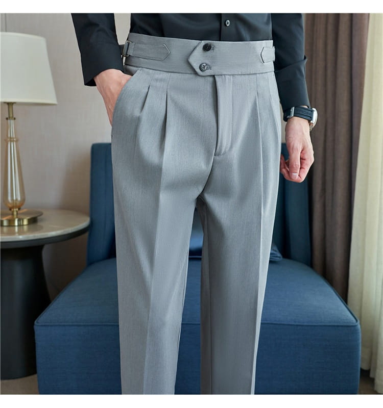 Men’s pleated drape casual trousers in gray featuring a structured waistband with two button closures and decorative notched flaps.