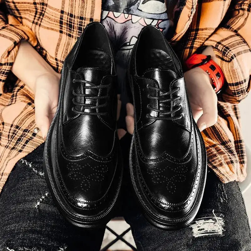 Men’s black leather brogue oxford shoes with perforated detailing polished finish and chunky sole suitable for business casual wear.