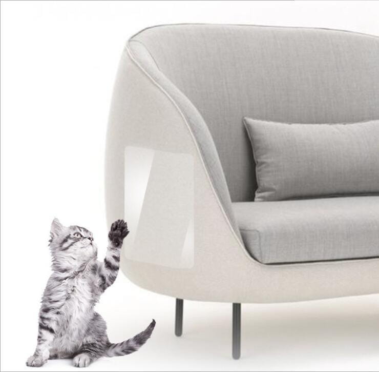 modern gray upholstered armchair with sleek curved design and minimalist metal legs shown with cat scratch protector furniture guard 30x45cm 2 pack for preventing damage
