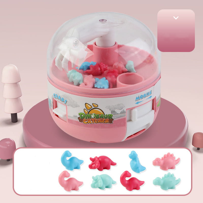 dinosaur mini gashapon machine kids claw toy featuring a pink and white dinosaur-themed cabinet with a clear dome containing colorful plastic dinosaurs inside.