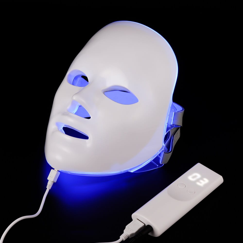 led facial mask white with blue light emitting from eye nose and mouth openings for 7 color red light photon skin therapy.