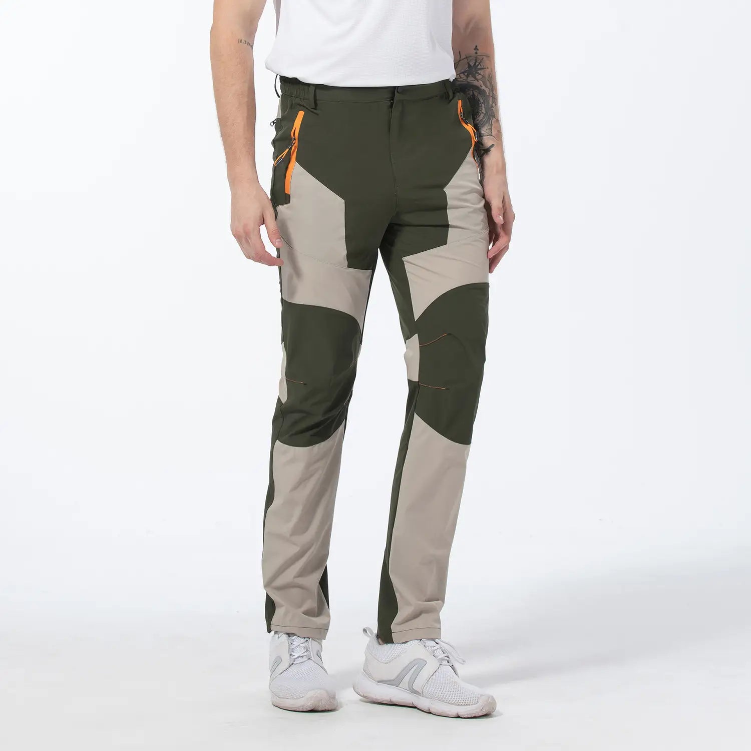 Men quick dry tactical hiking pants in olive and beige geometric pattern with orange zipper accents designed for outdoor use.