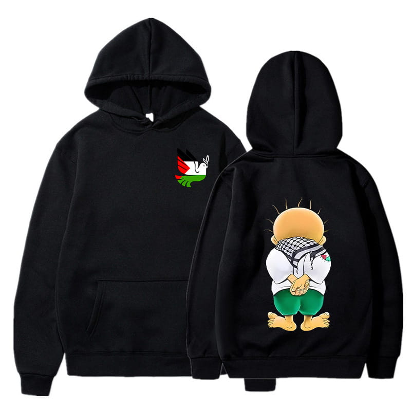 Sudadera con capucha negra con un personaje de caricatura que lleva vestimenta tradicional y una keffiyeh en la parte posterior, con un pequeño diseño de bandera palestina en el área del pecho frontal de la colección de sudaderas con capucha de streetwear con estampado de keffiyeh palestina de la paloma de la paz.