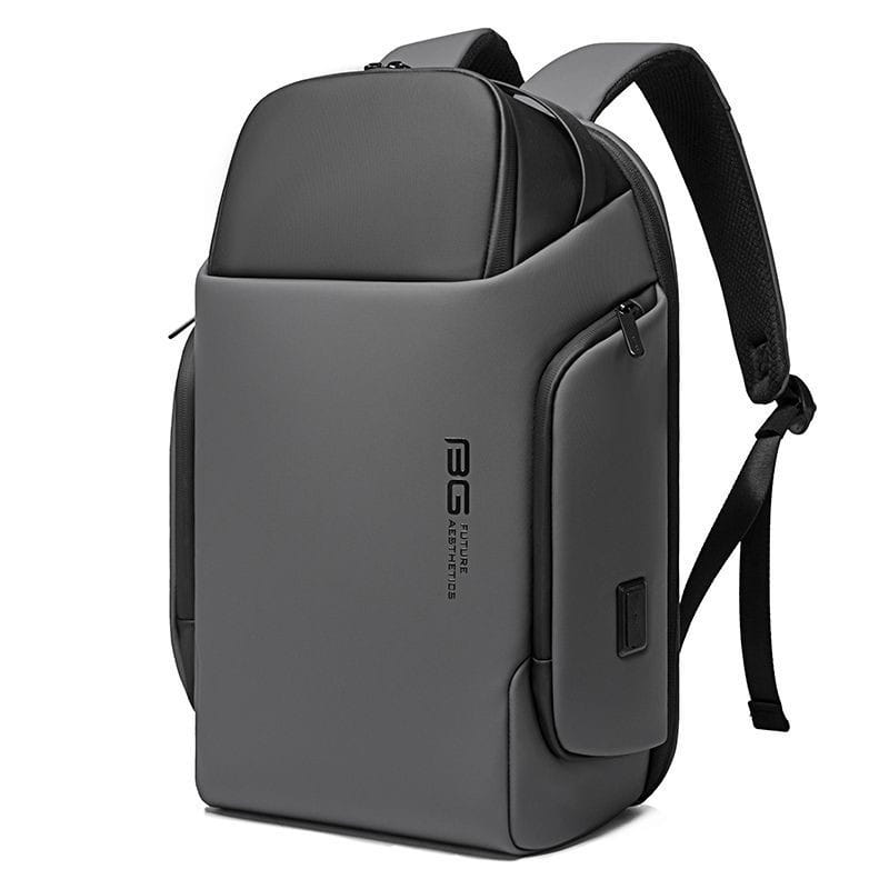 Gray tactical style business backpack with black shoulder straps and a subtle vertical logo designed for 15.6 inch waterproof laptop protection.