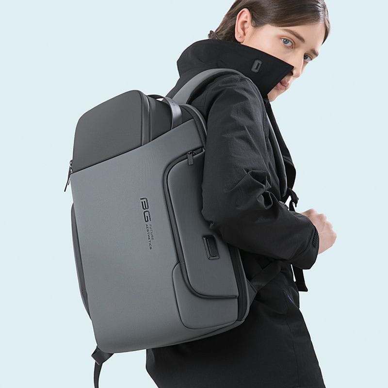 Gray tactical-style business backpack with black accents and sleek modern design for 15.6 inch waterproof laptop protection.