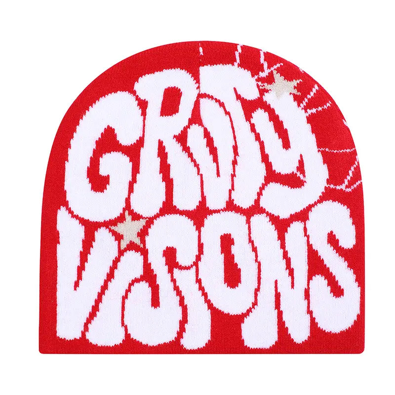 Red knit beanie hat featuring bold white groovy visions lettering and small star details.