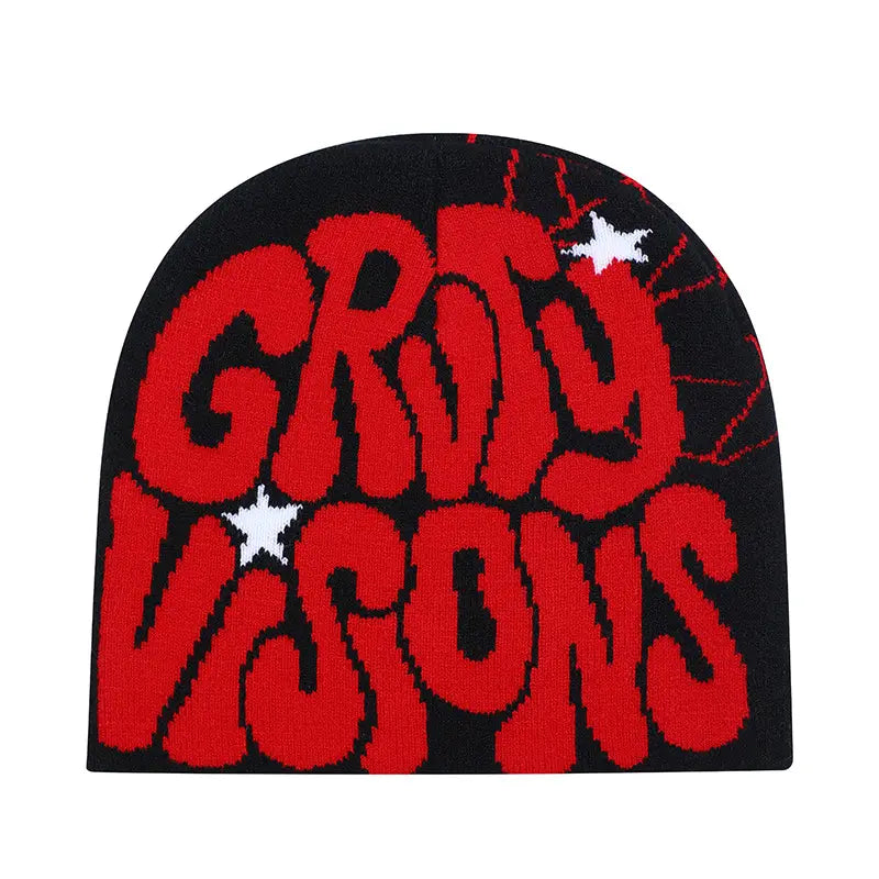 Black knit Grady Visions beanie hat featuring bold red groovy visions lettering with white stars and splatter details.