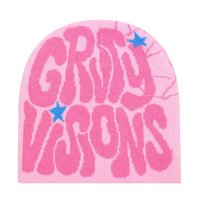 Pink knit grady visions beanie hat featuring bold grity visions lettering and blue star accents.