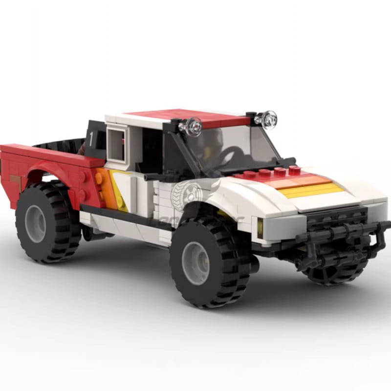 Red and white off-road pickup truck building block toy with black tires and yellow accents consisting of 403 pieces.