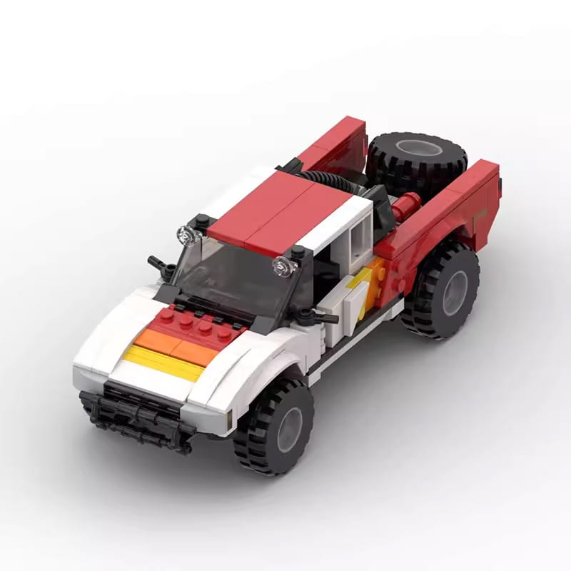 Red and white lego off-road pickup truck building block toy with black tires and a yellow orange stripe across the hood consisting of 403 pieces.