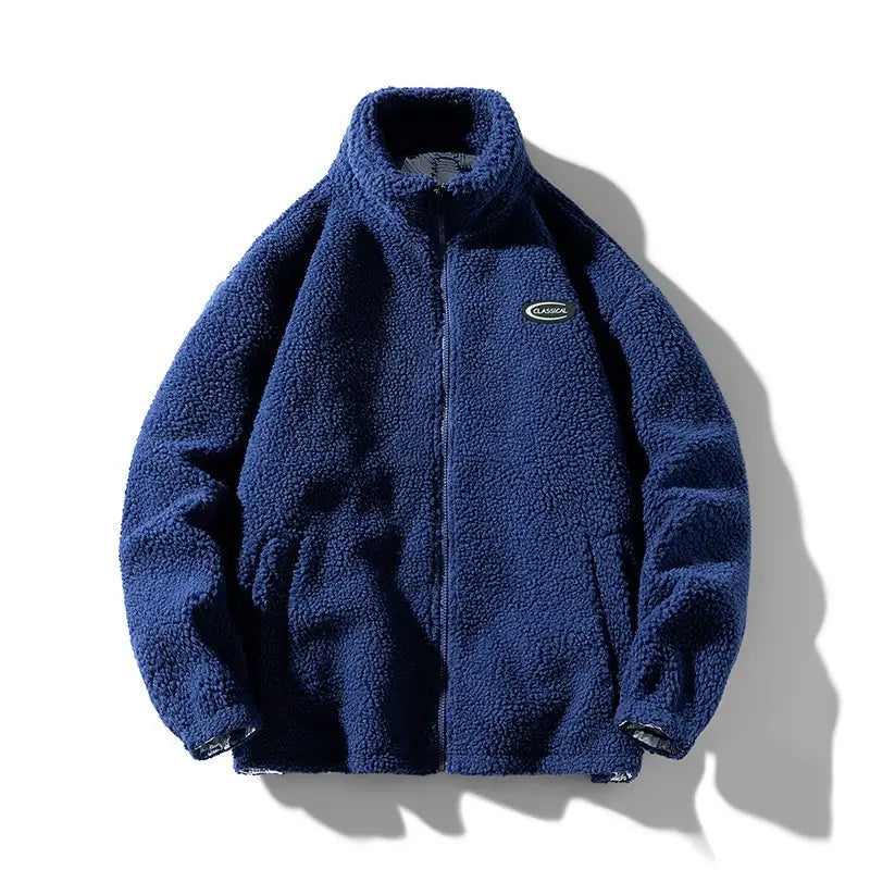Men fleece winter jacket in deep navy blue with plush textured fleece material and a small classic logo patch on the left chest ideal for loose casual outerwear.