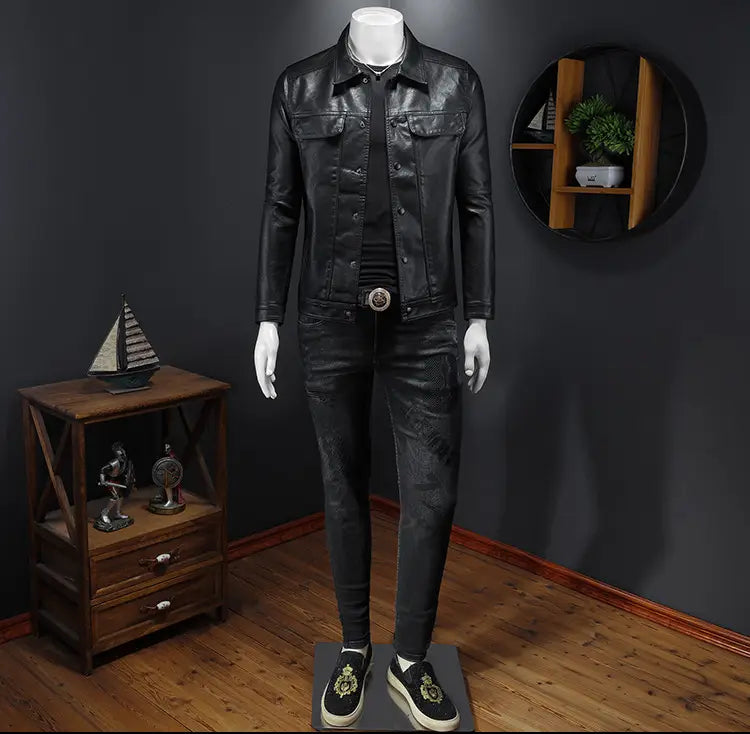 Men’s black faux leather motorcycle jacket with front button closure and two chest pockets.