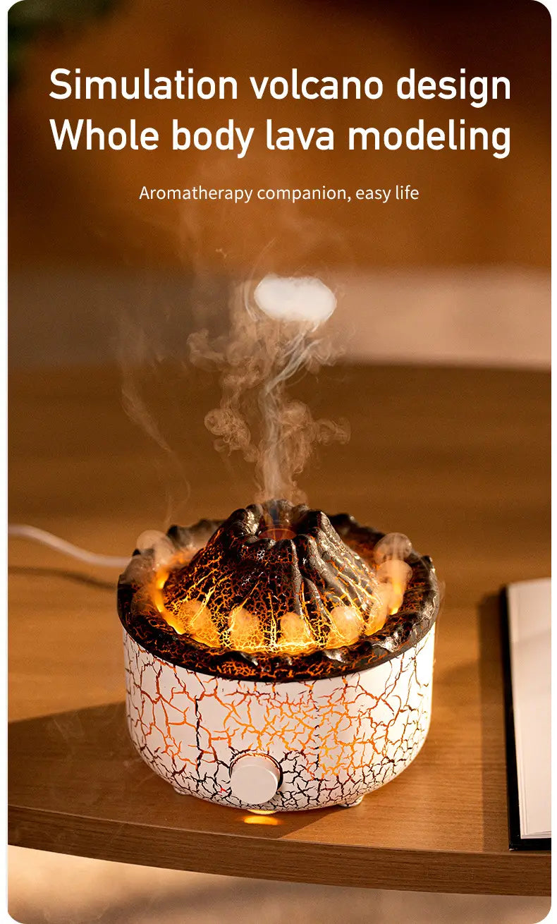 White cracked ceramic volcano essential oil diffuser ceramic flame humidifier with simulated volcano design emitting warm orange glow and steam.