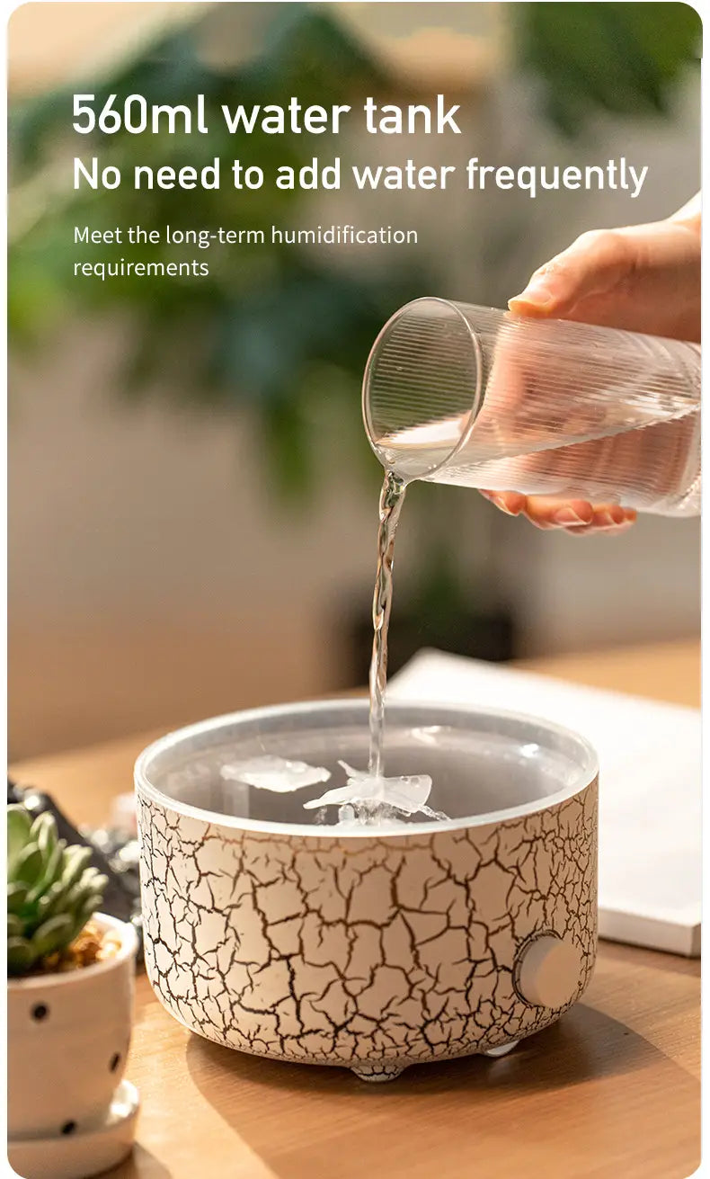 Cracked white ceramic volcano essential oil diffuser humidifier with a 560ml water tank.