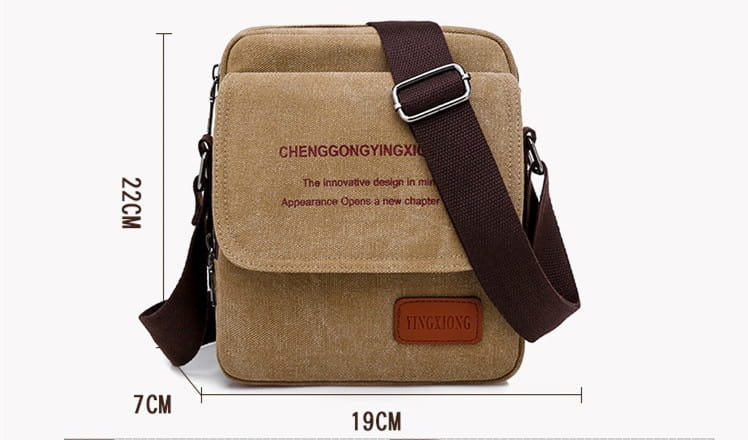 Men’s canvas crossbody business shoulder bag in tan with a dark brown adjustable strap and matching leather patch.