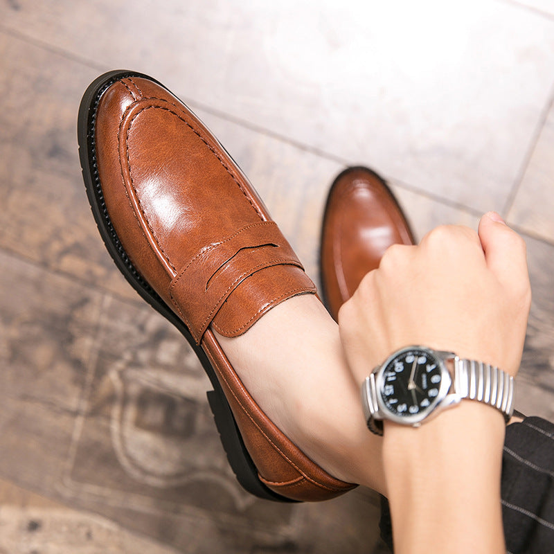 Men’s British style brown leather slip-on loafers with classic penny loafer design and black rubber sole