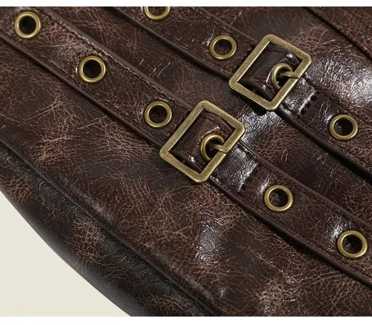 Brown leather punk crossbody bag strap featuring corset-style design with brass buckles and eyelets.