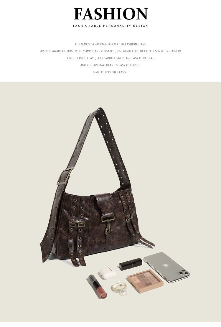Dark brown leather punk crossbody bag with metallic hardware and studded detailing.